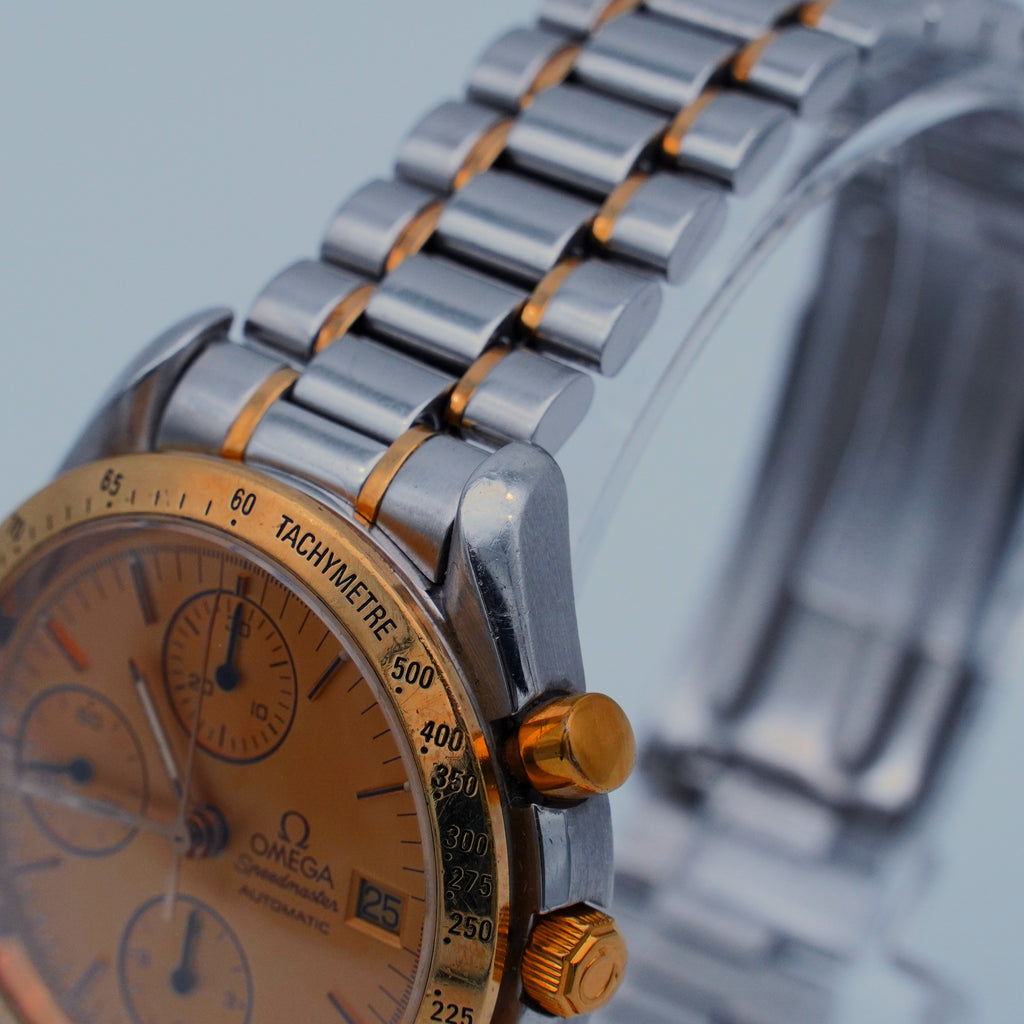 Omega Speedmaster Automatik Datum Stahl/Gold